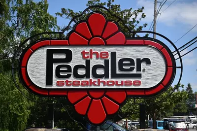 The Peddler Steakhouse sign