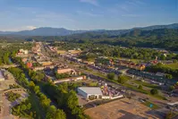 aerial view of Pigeon Forge Parkway and surrounding Smoky Mountains